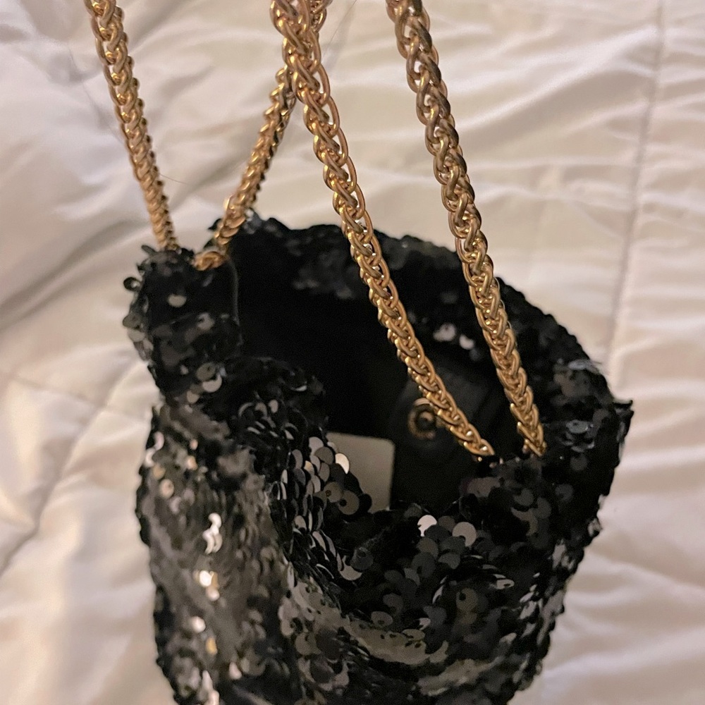 Small black sequin bucket bag